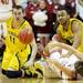 Michigan freshman Nik Stauskas looks on after sophomore Jon Horford knocked the ball loose from Indiana senior Jordan Hull in the first half at Assembly Hall on Saturday, Feb. 2 in Bloomington, Ind. Melanie Maxwell I AnnArbor.com